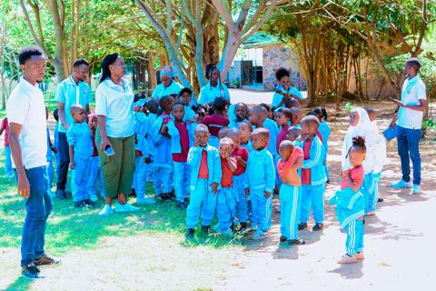 The Jupe Hills school community gathered beneath trees